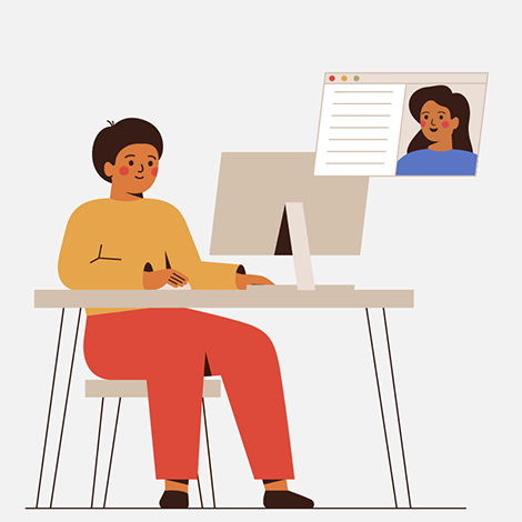 Frau zeigt auf den Bildschirm